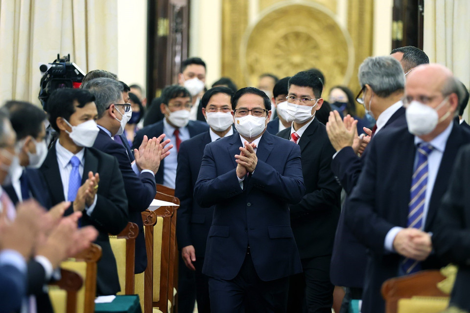 Thủ tướng Phạm Minh Chính đến dự buổi gặp các đối tác quốc tế. (Ảnh: Dương Giang/TTXVN)