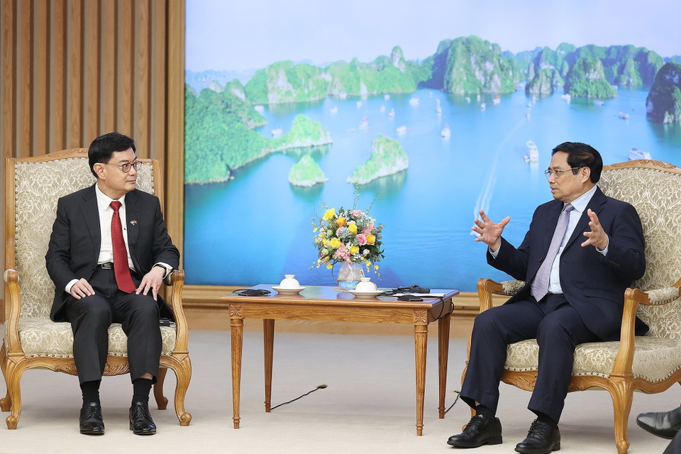 Thủ tướng Phạm Minh Chính tiếp Phó Thủ tướng Singapore Heng Swee Keat. (Ảnh: Dương Giang/TTXVN)