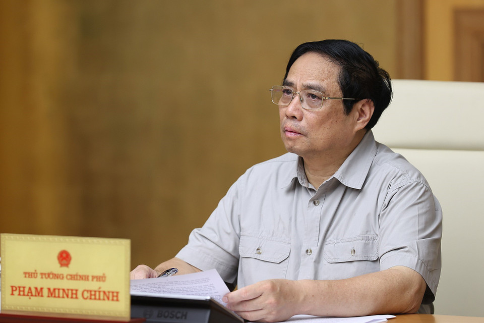 Thủ tướng Phạm Minh Chính chủ trì họp ứng phó cơn bão số 4. (Ảnh: Dương Giang/TTXVN)