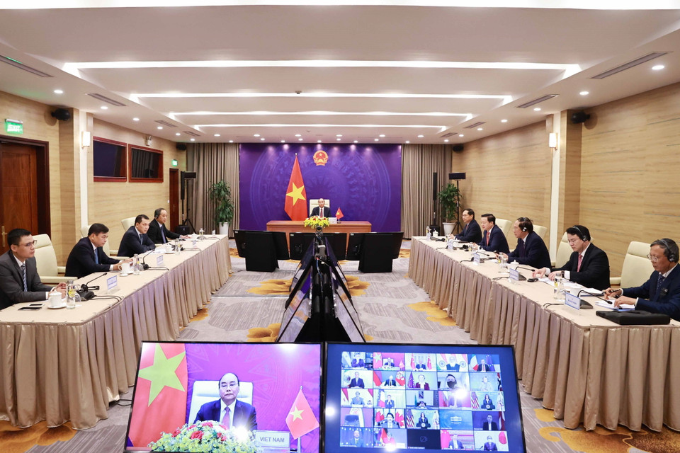 Chủ tịch nước Nguyễn Xuân Phúc và đoàn đại biểu Việt Nam tại điểm cầu Hà Nội. (Ảnh: Thống Nhất/TTXVN)