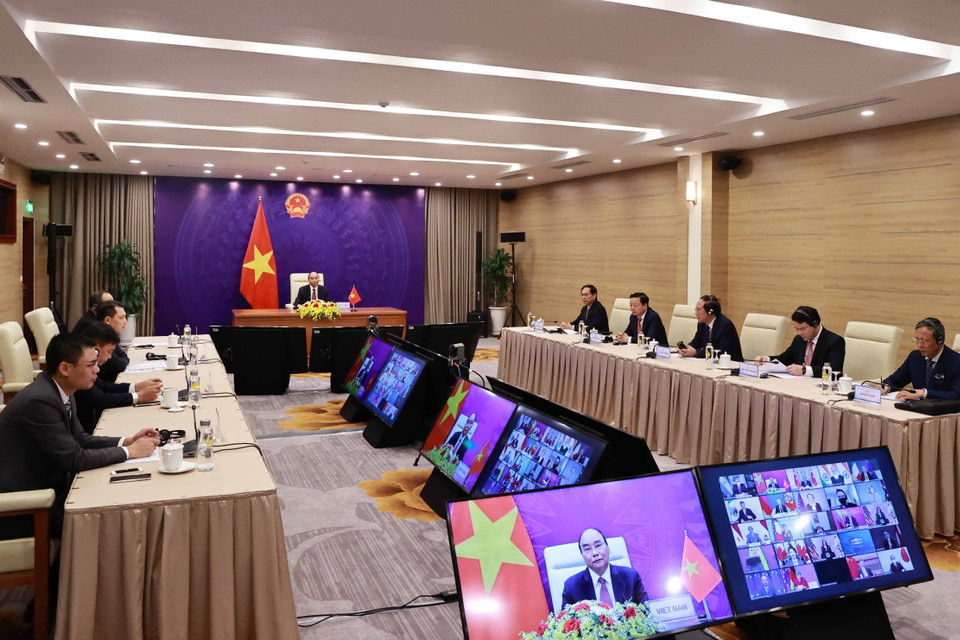 Chủ tịch nước Nguyễn Xuân Phúc và đoàn đại biểu Việt Nam tại điểm cầu Hà Nội. (Ảnh: Thống Nhất/TTXVN)