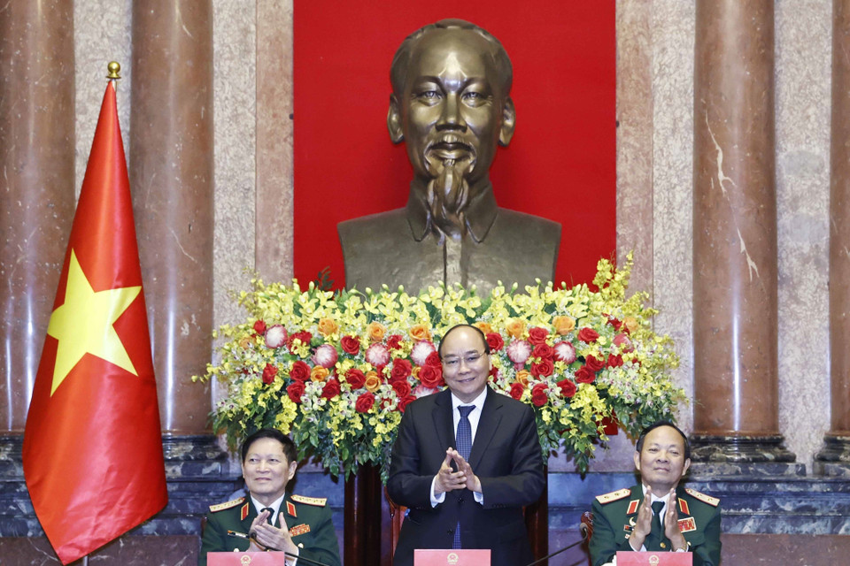 Chủ tịch nước Nguyễn Xuân Phúc chủ trì buổi gặp mặt. (Ảnh: Thống Nhất/TTXVN)