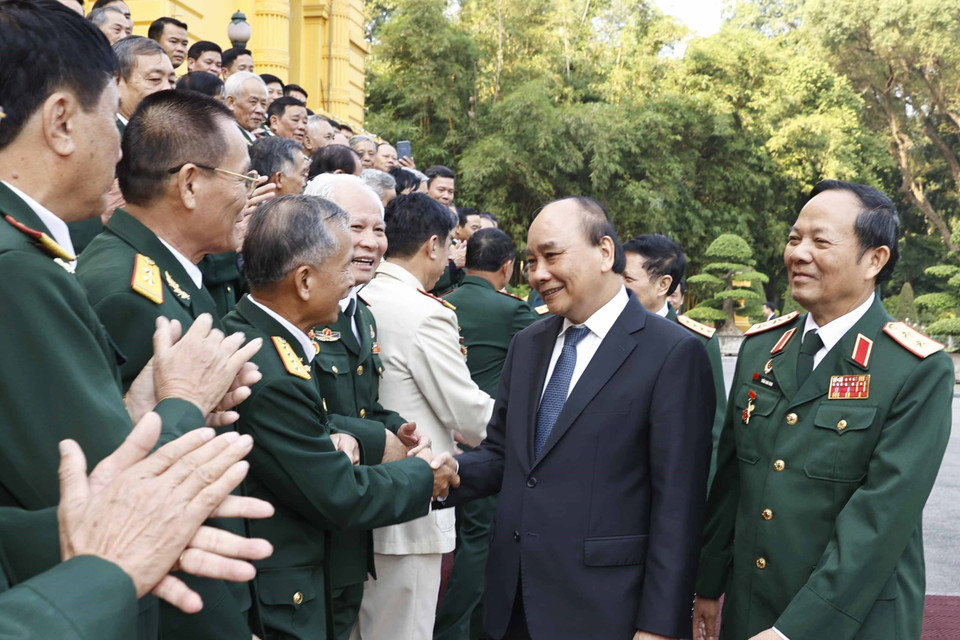 Chủ tịch nước với các cựu chiến binh Sư đoàn 341. (Ảnh: Thống Nhất/TTXVN)