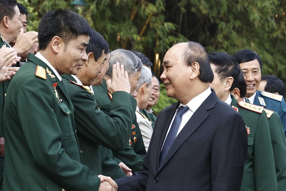 Chủ tịch nước với các cựu chiến binh Sư đoàn 341. (Ảnh: Thống Nhất/TTXVN)