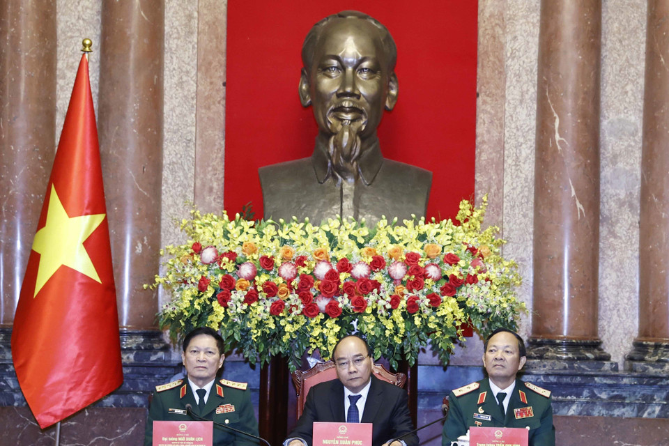 Chủ tịch nước Nguyễn Xuân Phúc chủ trì buổi gặp mặt. (Ảnh: Thống Nhất/TTXVN)