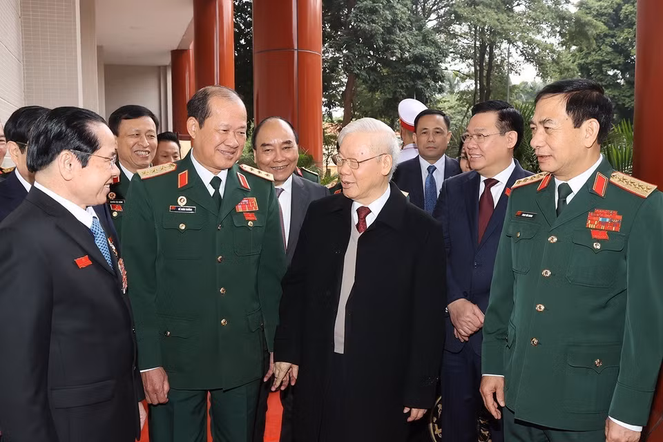 Tổng Bí thư Nguyễn Phú Trọng cùng các đồng chí lãnh đạo Đảng, Nhà nước với đại biểu dự đại hội. (Ảnh: Trí Dũng/TTXVN)