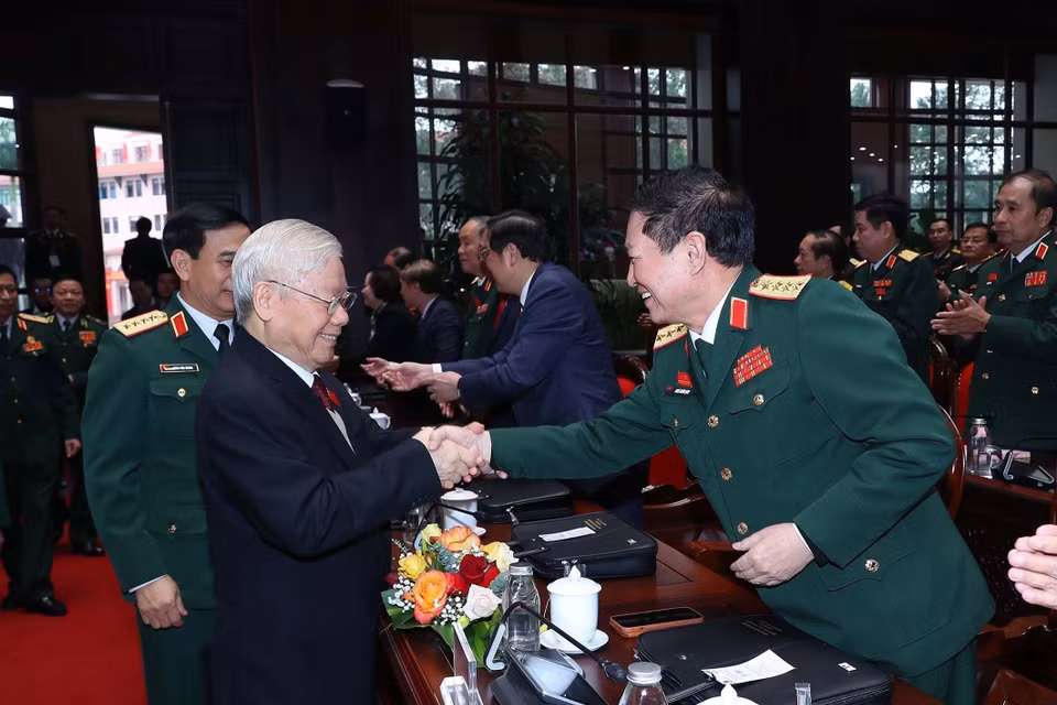 Tổng Bí thư Nguyễn Phú Trọng và các đại biểu dự đại hội. (Ảnh: TTXVN)