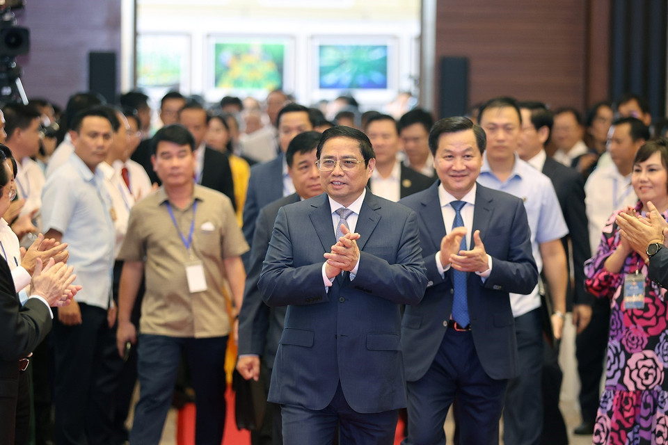 Thủ tướng Phạm Minh Chính và các đại biểu đến dự hội nghị. (Ảnh: Dương Giang/TTXVN)