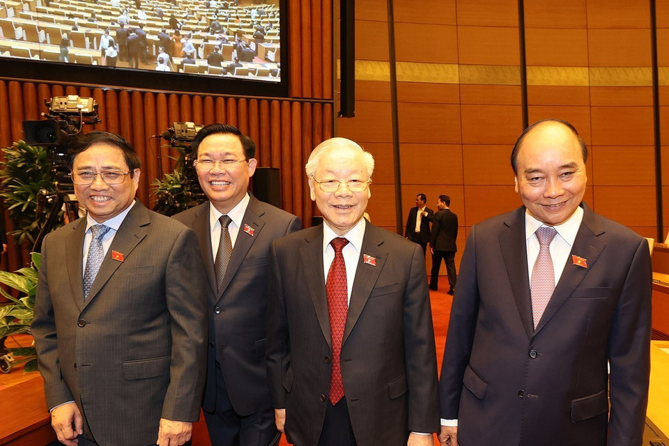 Tổng Bí thư Nguyễn Phú Trọng, Chủ tịch nước Nguyễn Xuân Phúc, Thủ tướng Chính phủ Phạm Minh Chính, Chủ tịch Quốc hội Vương Đình Huệ dự bế mạc Kỳ họp thứ tư, Quốc hội khóa XV. (Ảnh: Trí Dũng/TTXVN)