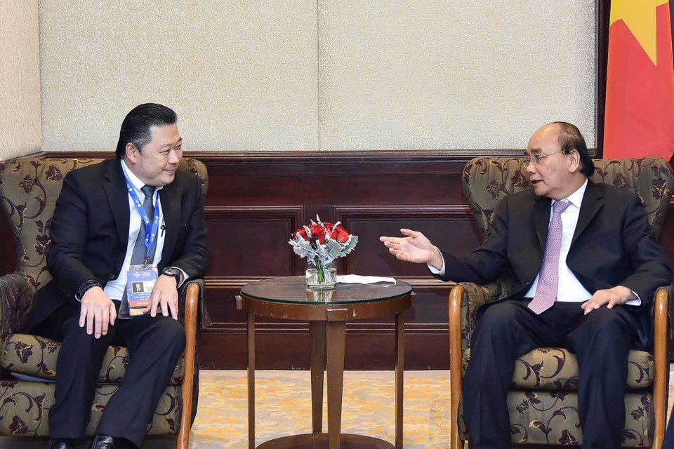 Chiều 17/11, tại thủ đô Bangkok (Thái Lan), Chủ tịch nước Nguyễn Xuân Phúc tiếp Chủ tịch Tập đoàn CP Dhanim Chearnont. (Ảnh: Thống Nhất/TTXVN)