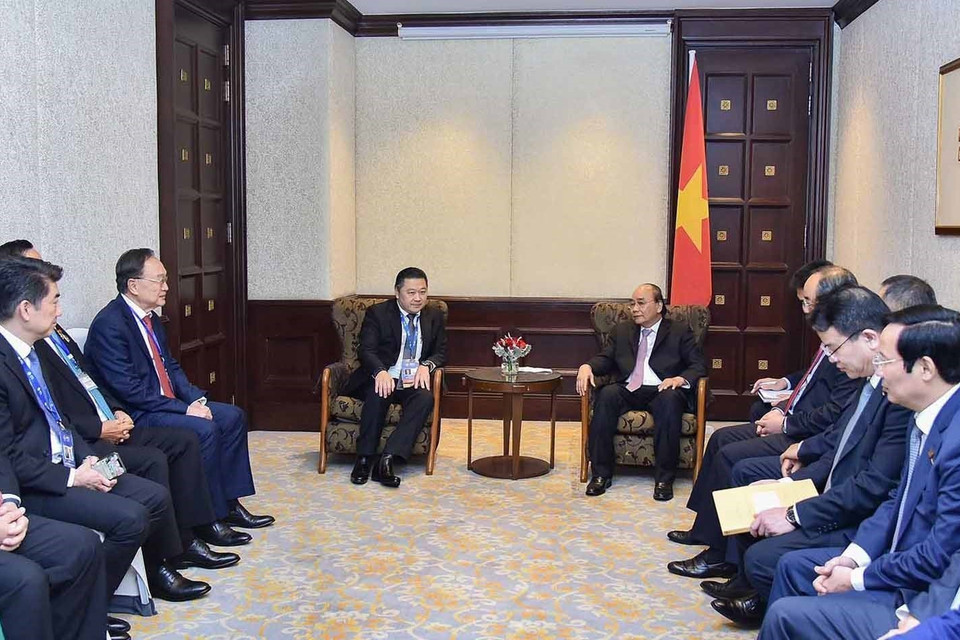 Chiều 17/11, tại thủ đô Bangkok (Thái Lan), Chủ tịch nước Nguyễn Xuân Phúc tiếp Chủ tịch Tập đoàn CP Dhanim Chearnont. (Ảnh: Thống Nhất/TTXVN)