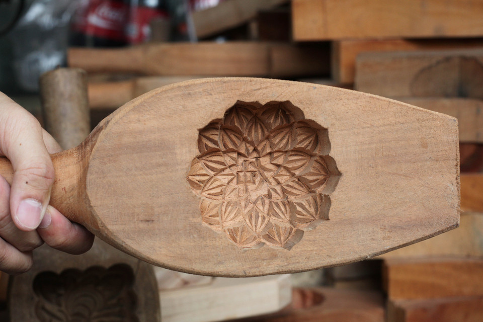 Khuôn bánh với tạo hình truyền thống. (Ảnh: Doãn Đức/Vietnam+)