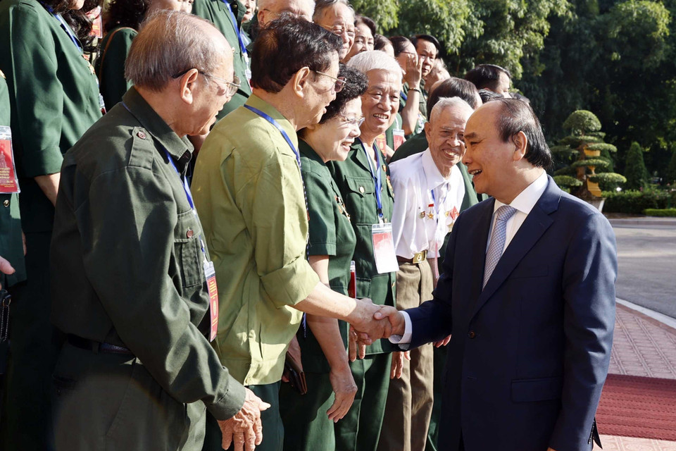 Chủ tịch nước Nguyễn Xuân Phúc với các đại biểu. (Ảnh: Thống Nhất/TTXVN) 