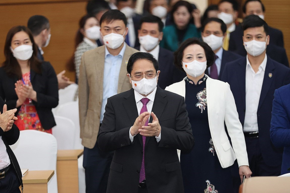  Thủ tướng Phạm Minh Chính đến dự Hội nghị trực tuyến toàn quốc tổng kết công tác năm 2021 và triển khai nhiệm vụ năm 2022 của ngành nội vụ. (Ảnh: Dương Giang/TTXVN)