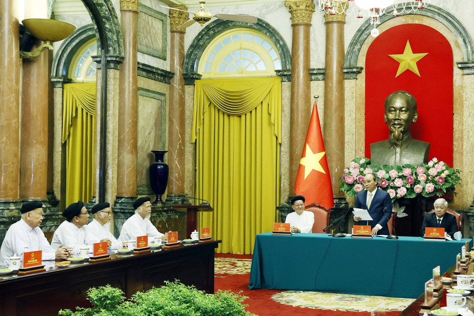 Chủ tịch nước Nguyễn Xuân Phúc phát biểu tại buổi tiếp chức sắc các Hội thánh và Tổ chức Cao Đài. (Ảnh: Thống Nhất/TTXVN)