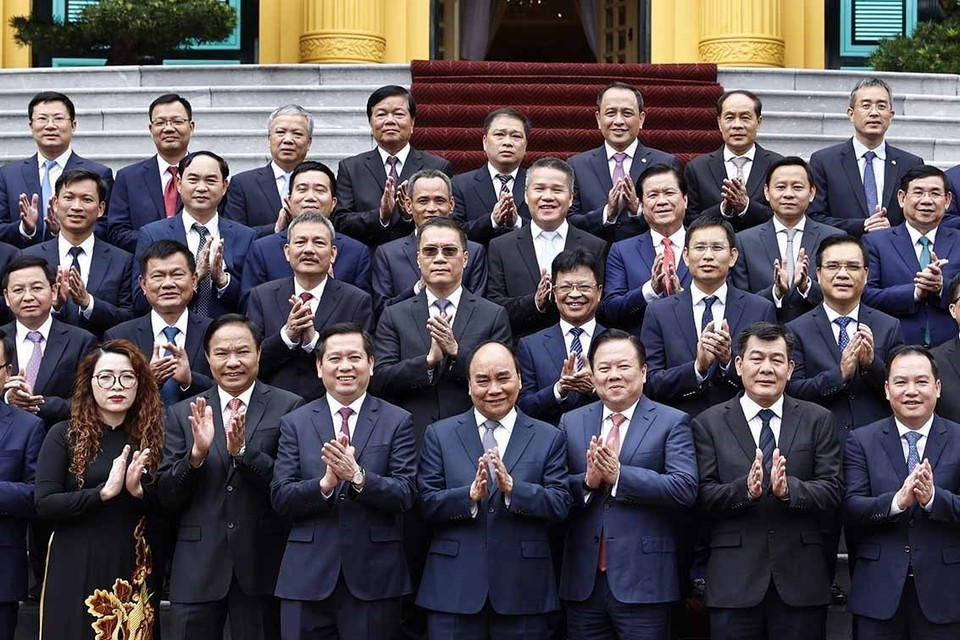 Chủ tịch nước Nguyễn Xuân Phúc với các đại biểu. (Ảnh: Thống Nhất/TTXVN)