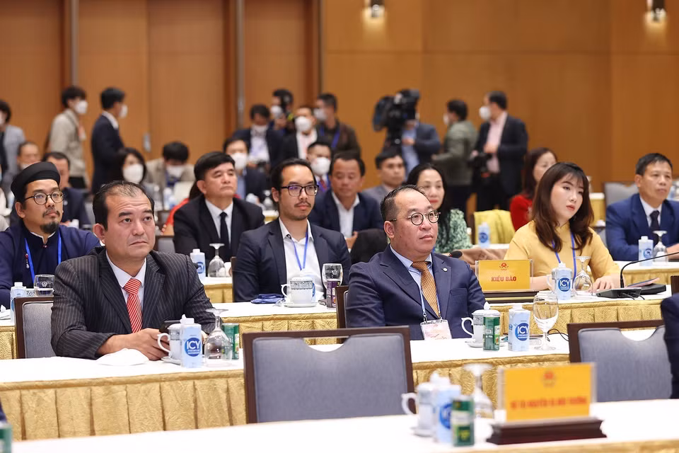 Các kiều bào tham dự buổi gặp mặt. (Ảnh: Dương Giang/TTXVN)