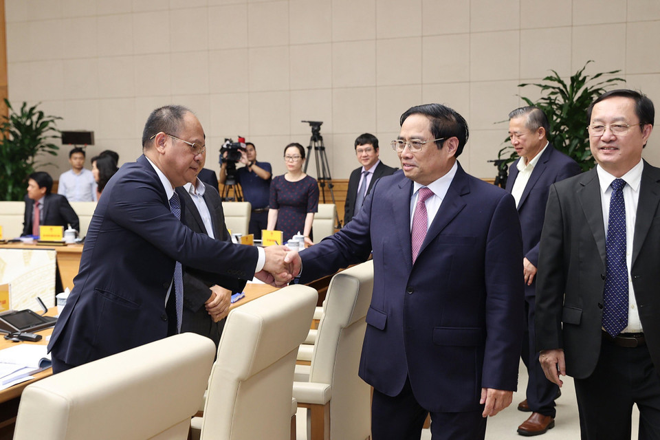 Thủ tướng Phạm Minh Chính với các đại biểu dự hội nghị phát triển thị trường khoa học và công nghệ. (Ảnh: Dương Giang/TTXVN)