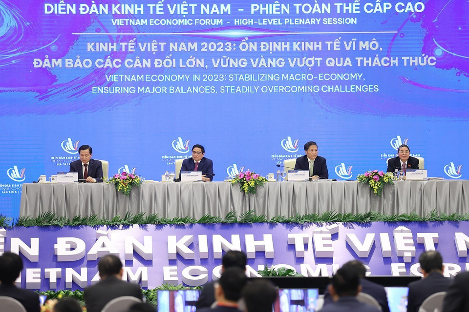 Diễn đàn Kinh tế Việt Nam có chủ đề: Kinh tế Việt Nam năm 2023: Ổn định kinh tế vĩ mô, đảm bảo các cân đối lớn, vững vàng vượt qua thử thách. (Ảnh: Dương Giang/TTXVN)