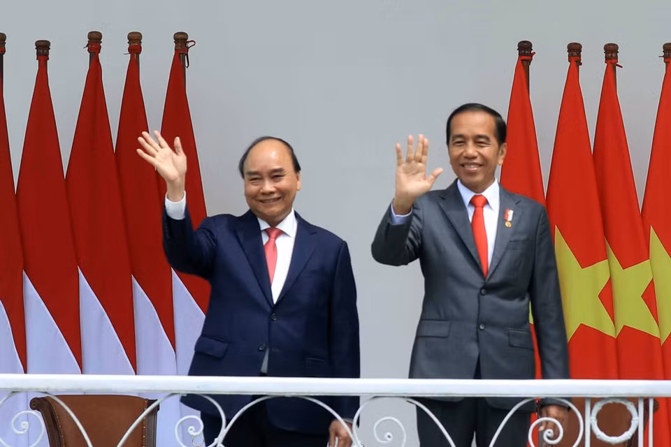 Chủ tịch nước Nguyễn Xuân Phúc và Tổng thống nước Cộng hòa Indonesia Joko Widodo. (Ảnh: Thống Nhất/TTXVN)