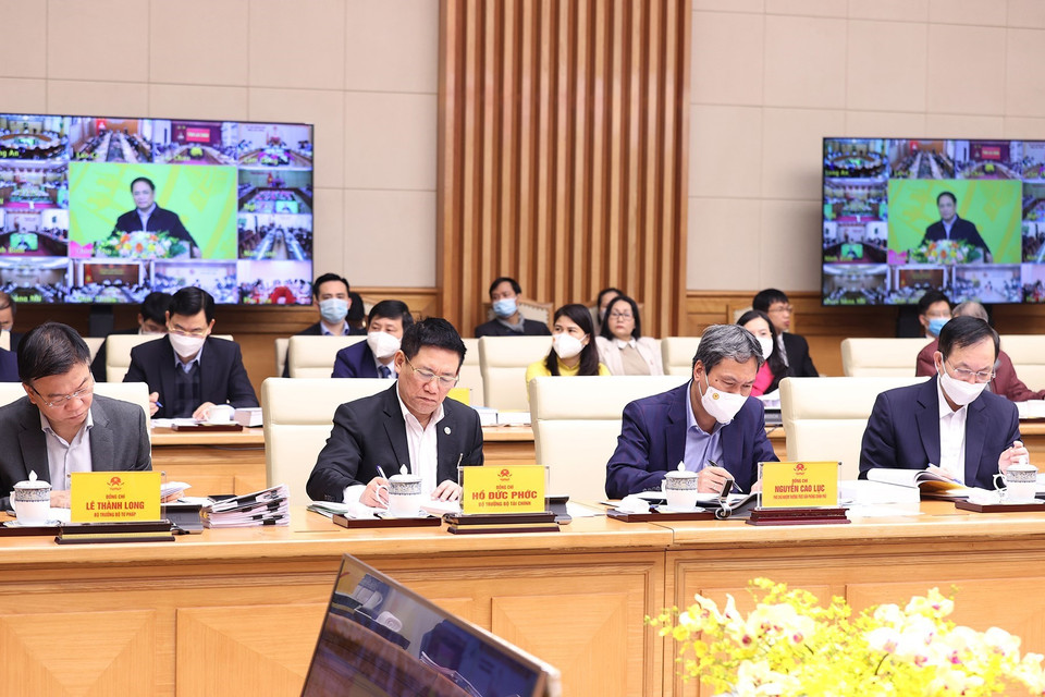 Các đại biểu tham dự hội nghị tại điểm cầu Chính phủ. (Ảnh: Dương Giang/TTXVN)