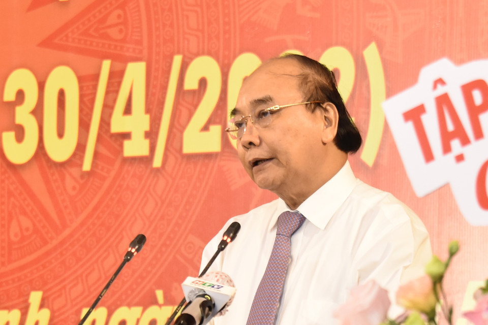 Chủ tịch nước Nguyễn Xuân Phúc phát biểu tại buổi họp mặt. (Ảnh: Thu Hương/TTXVN)