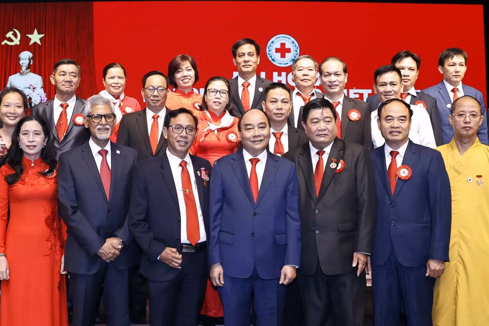 Chủ tịch nước Nguyễn Xuân Phúc với các đại biểu dự Đại hội. (Ảnh: Thống Nhất/TTXVN)