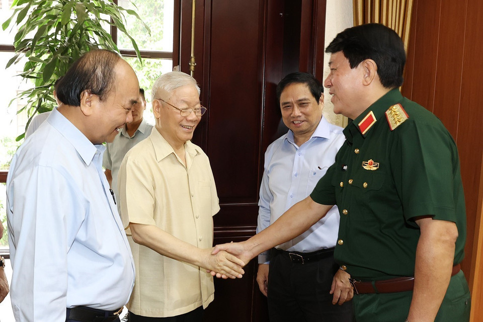 Hình ảnh Tổng Bí thư Nguyễn Phú Trọng, Chủ tịch nước Nguyễn Xuân Phúc, Thủ tướng Phạm Minh Chính với đại biểu dự hội nghị. (Ảnh: Trí Dũng/TTXVN)