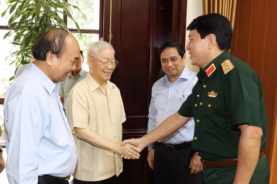 Hình ảnh Tổng Bí thư Nguyễn Phú Trọng, Chủ tịch nước Nguyễn Xuân Phúc, Thủ tướng Phạm Minh Chính với đại biểu dự hội nghị. (Ảnh: Trí Dũng/TTXVN)