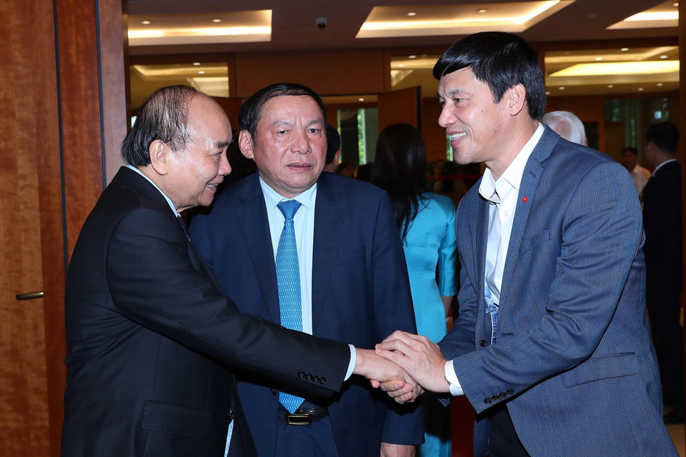 Chủ tịch nước Nguyễn Xuân Phúc và các đại biểu Quốc hội. (Ảnh: TTXVN)