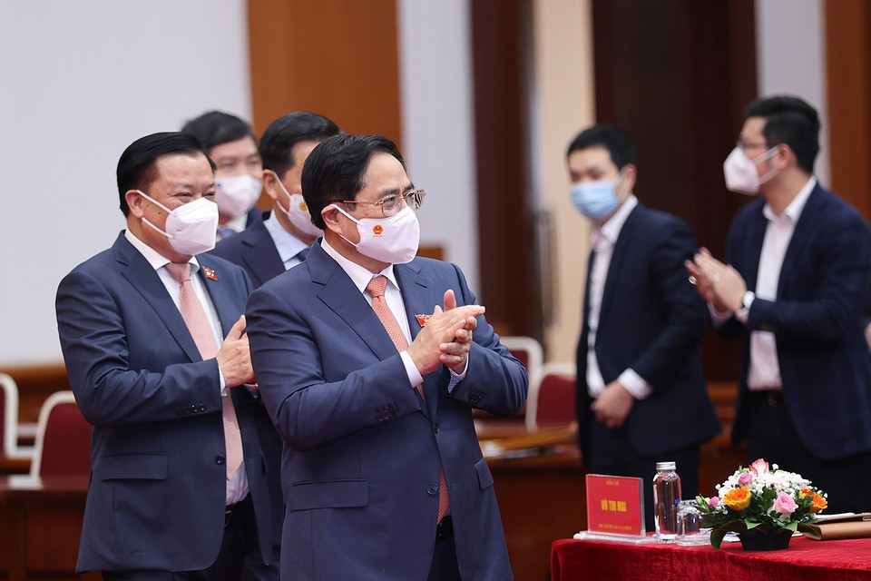 Thủ tướng Phạm Minh Chính đến dự hội nghị trực tuyến tổng kết công tác tài chính-ngân sách nhà nước năm 2021 và triển khai nhiệm vụ năm 2022. (Ảnh: Dương Giang/TTXVN)