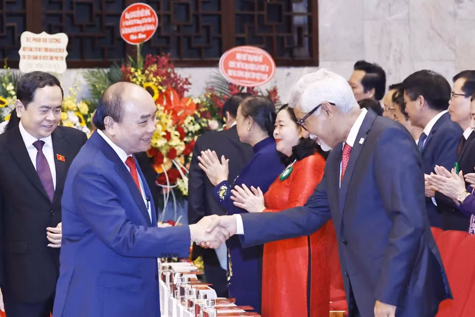 Hình ảnh Chủ tịch nước Nguyễn Xuân Phúc với các đại biểu. (Ảnh: Thống Nhất/TTXVN)
