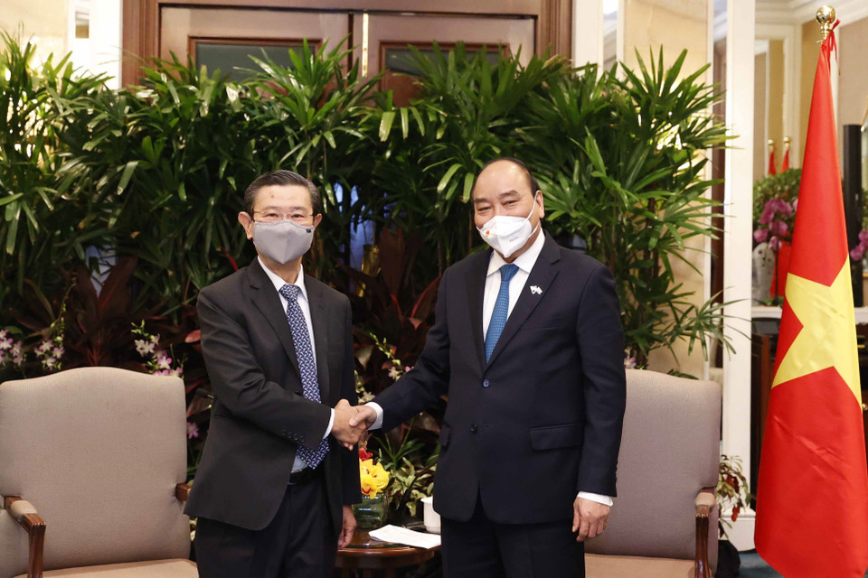 Chủ tịch nước Nguyễn Xuân Phúc tiếp ông Jason Leow, Tổng Giám đốc CapitaLand Development (CLD), nhánh kinh doanh phát triển bất động sản của Tập đoàn CapitaLand. (Ảnh: Thống Nhất/TTXVN)