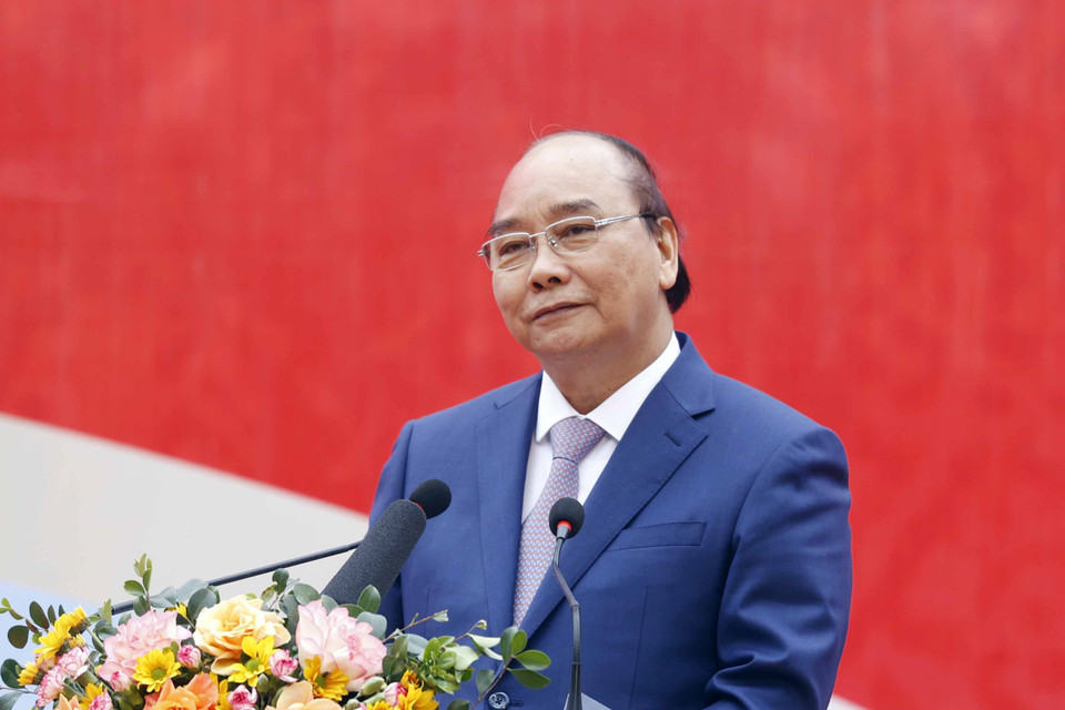 Chủ tịch nước Nguyễn Xuân Phúc phát biểu tại lễ phát động thi đua của Tập đoàn Dệt may Việt Nam. (Ảnh: Thống Nhất/TTXVN)