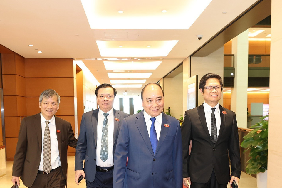 Chủ tịch nước Nguyễn Xuân Phúc cùng các đại biểu tới dự phiên bế mạc. (Ảnh: Trí Dũng/TTXVN)