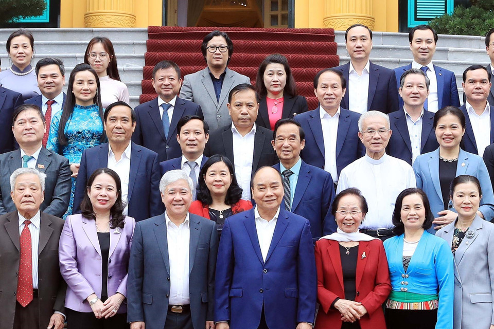 Chủ tịch nước Nguyễn Xuân Phúc với các đại biểu. (Ảnh: Thống Nhất/TTXVN)