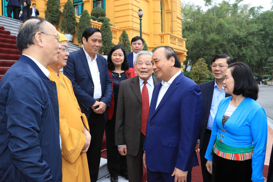 Chủ tịch nước Nguyễn Xuân Phúc với các đại biểu. (Ảnh: Thống Nhất/TTXVN)