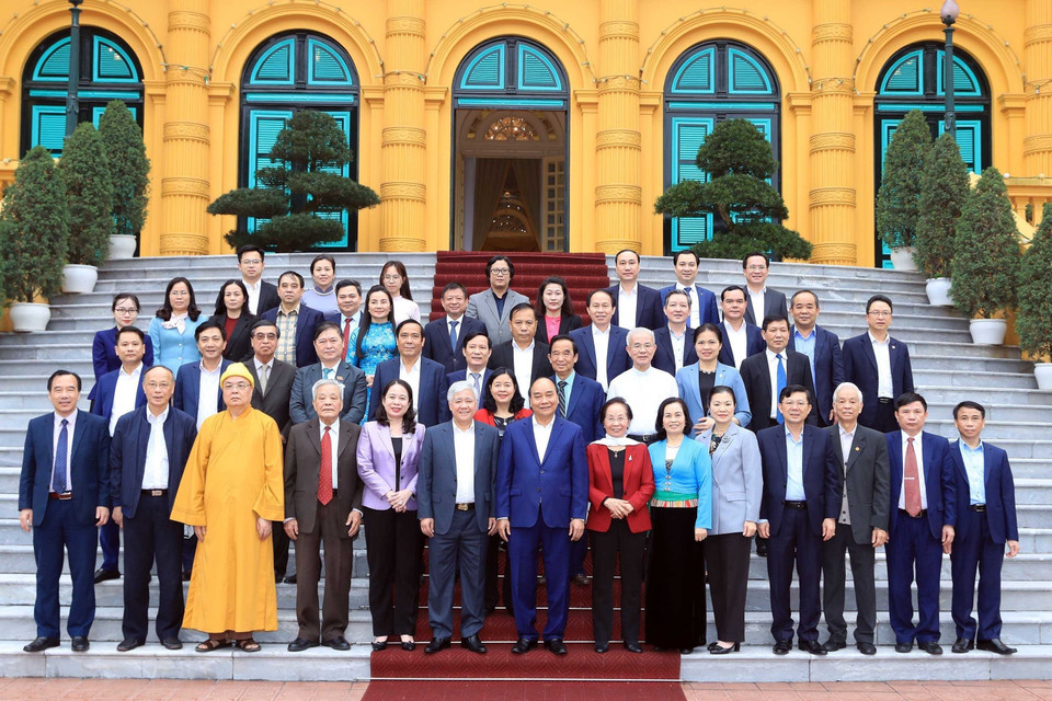 Chủ tịch nước Nguyễn Xuân Phúc với các đại biểu. (Ảnh: Thống Nhất/TTXVN)