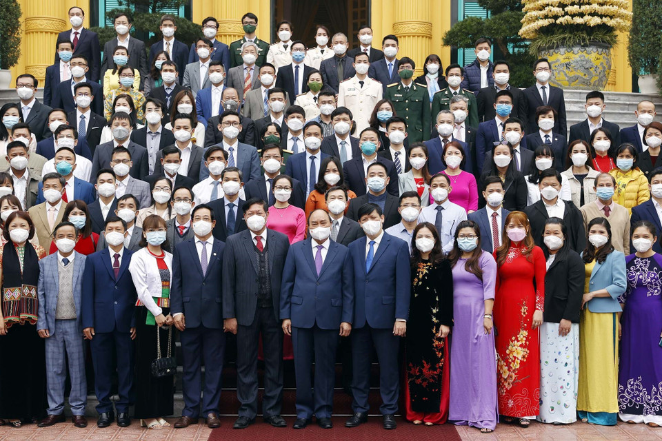 Chủ tịch nước Nguyễn Xuân Phúc và các đại biểu. (Ảnh: Thống Nhất/TTXVN)