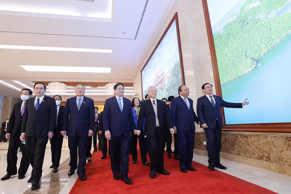 Tổng Bí thư Nguyễn Phú Trọng, Chủ tịch nước Nguyễn Xuân Phúc và Chủ tịch Quốc hội Vương Đình Huệ đến dự hội nghị. (Ảnh: Dương Giang/TTXVN)