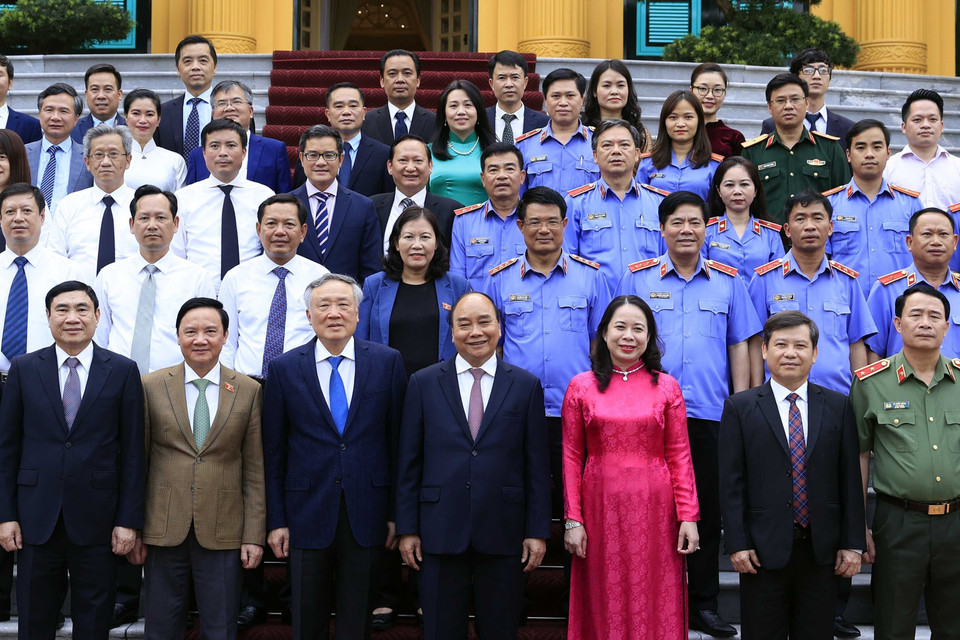 Chủ tịch nước Nguyễn Xuân Phúc với các đại biểu dự Lễ ký Quy chế phối hợp công tác. (Ảnh: Thống Nhất/TTXVN)