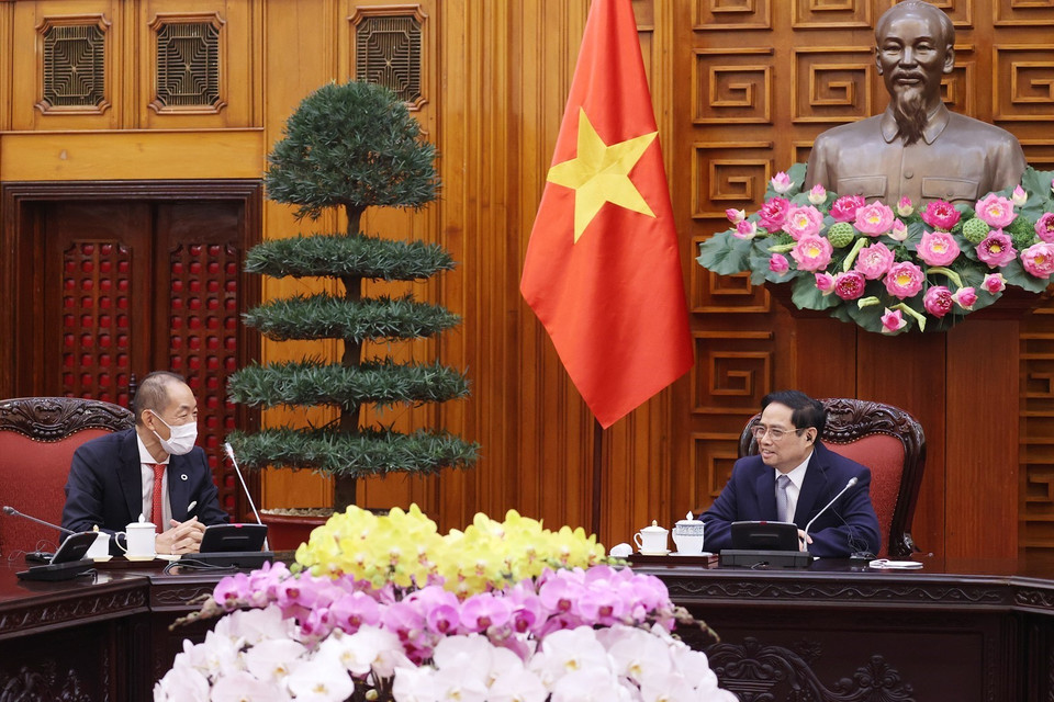 Thủ tướng Phạm Minh Chính tiếp Giám đốc WHO khu vực Tây Thái Bình Dương Takeshi Kasai. (Ảnh: Dương Giang/TTXVN)