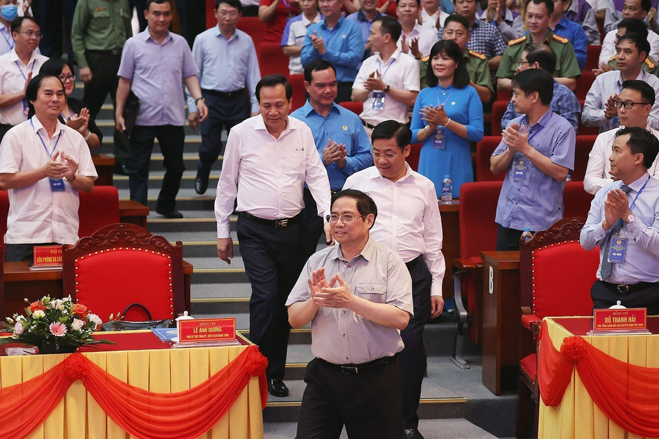 Thủ tướng Phạm Minh Chính đến dự đối thoại với công nhân lao động năm 2022. (Ảnh: Dương Giang/TTXVN)