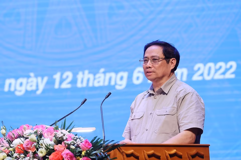 Thủ tướng Chính phủ Phạm Minh Chính gặp gỡ đối thoại với công nhân lao động năm 2022. (Ảnh: Dương Giang/TTXVN)
