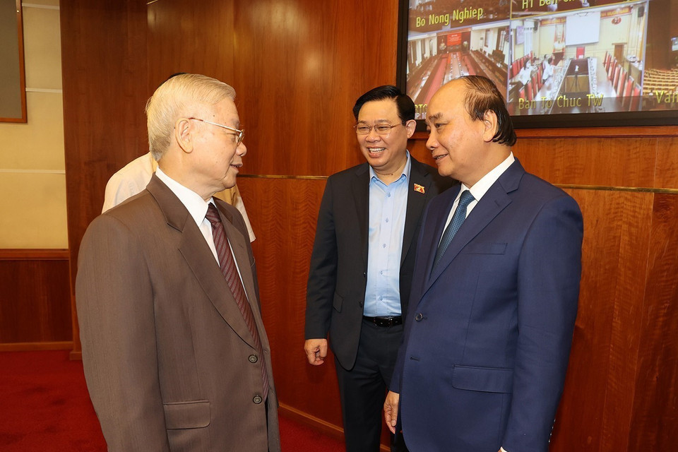  Tổng Bí thư Nguyễn Phú Trọng, Chủ tịch nước Nguyễn Xuân Phúc, Chủ tịch Quốc hội Vương Đình Huệ dự hội nghị. (Ảnh: Trí Dũng/TTXVN)