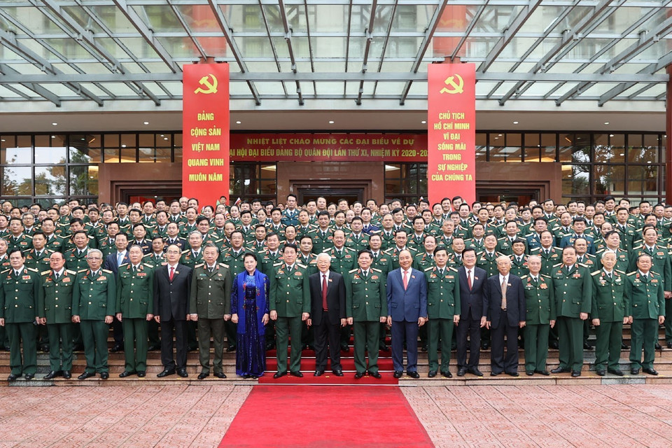 Tổng Bí thư, Chủ tịch nước, Bí thư Quân ủy Trung ương Nguyễn Phú Trọng và Thủ tướng Chính phủ Nguyễn Xuân Phúc, Chủ tịch Quốc hội Nguyễn Thị Kim Ngân và các đại biểu dự Đại hội. (Ảnh: Trí Dũng/TTXVN) a