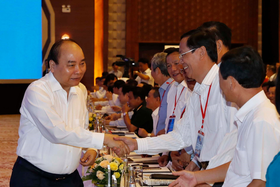 Thủ tướng Nguyễn Xuân Phúc với các đại biểu dự hội nghị. (Ảnh: Thống Nhất/TTXVN)