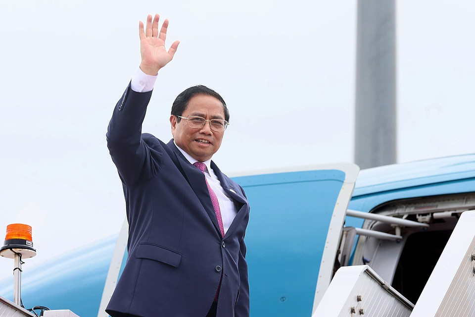 Thủ tướng Phạm Minh Chính kết thúc chuyến tham dự CAEXPO và CABIS lần thứ 20 tại Nam Ninh, Trung Quốc. (Ảnh: Dương Giang/TTXVN)