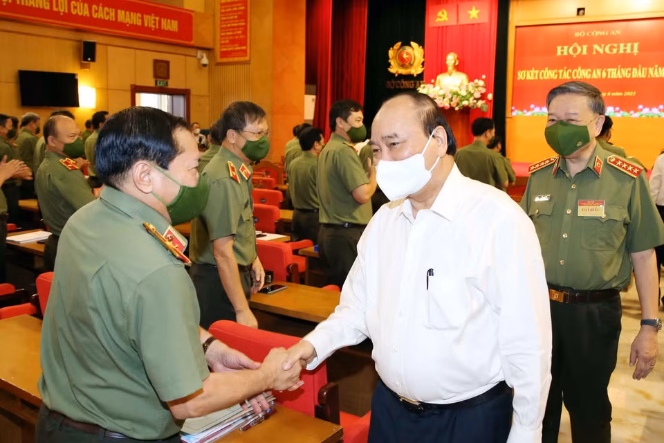 Chủ tịch nước Nguyễn Xuân Phúc với các đại biểu tham dự hội nghị. (Ảnh: Phạm Kiên/TTXVN)