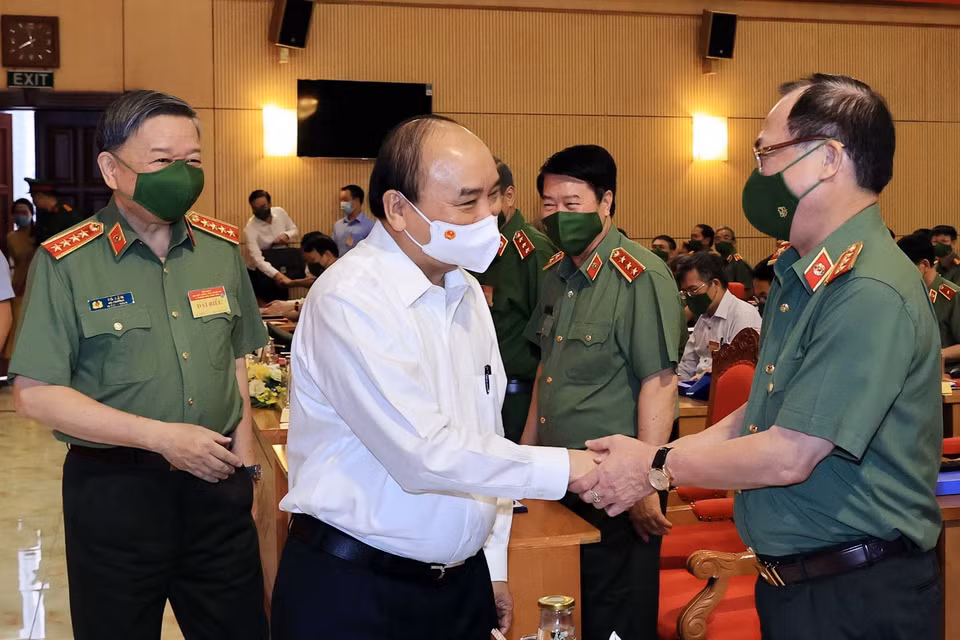 Chủ tịch nước Nguyễn Xuân Phúc với các đại biểu dự hội nghị. (Ảnh: Thống Nhất/TTXVN)